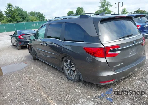 2021 Honda Odyssey Touring z USA, uszkodzony, nr VIN 5FNRL6H84MB002272